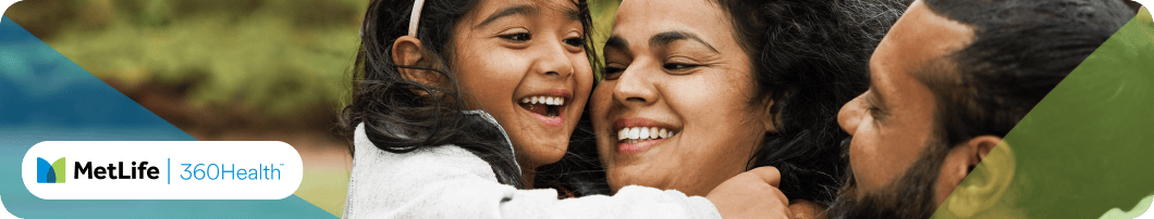Mother and daughter smiling.