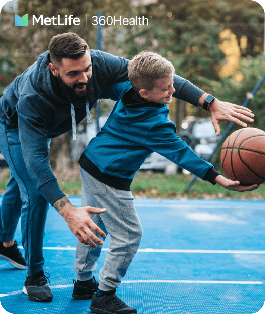 Father and son playing basketball