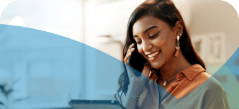 Two people at home in their kitchen talking