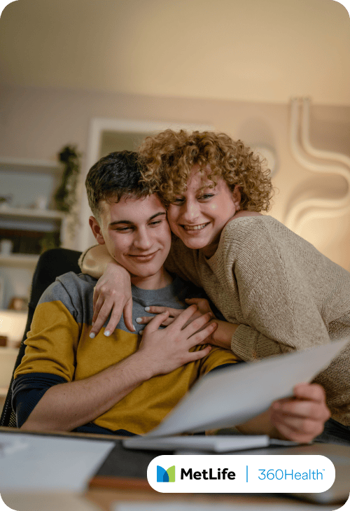 Woman and son looking at a piece of paper