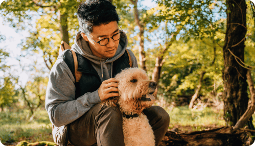 Man with dog outside