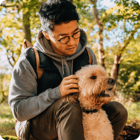 Man with dog outside