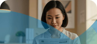 Woman reading documents at home