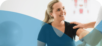 Woman getting help from a physical therapist